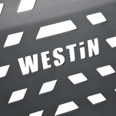 Close-Up of Westin Logo on Skid Plate - Textured Black Steel - Durable Design